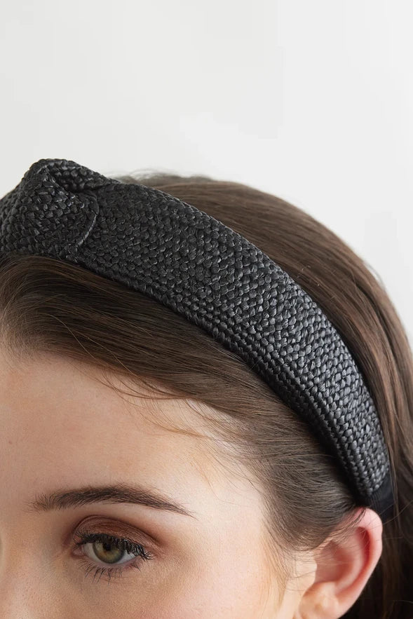 Bowies World Capri Headband - Black at cloth in brick close up