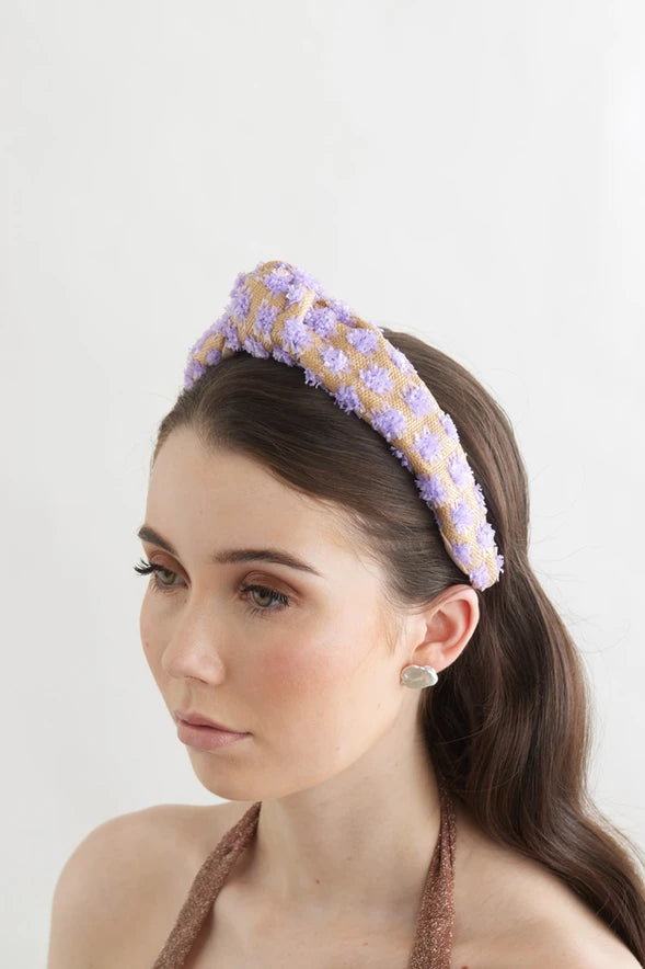 Bowies World Lisbon Headband - Lilac at cloth in brick zoomed out side view