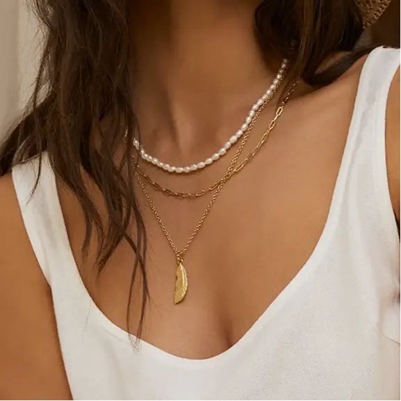 Feather Gold Necklace Arms of Eve