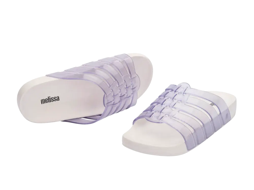 Melissa Possession Slide - Clear/White Pair flat and on its side view