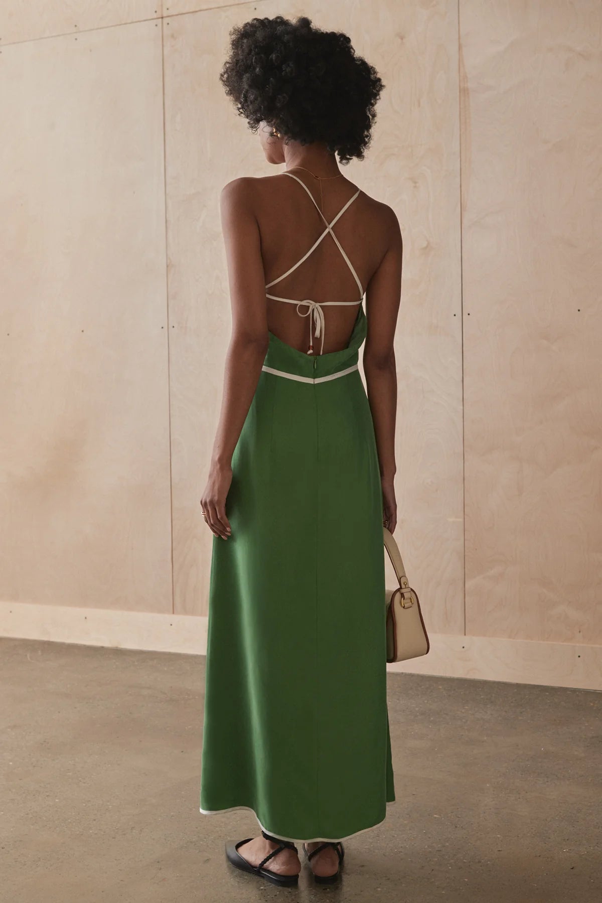 Sancia Isobel Dress - Matcha at cloth in brick back view close up