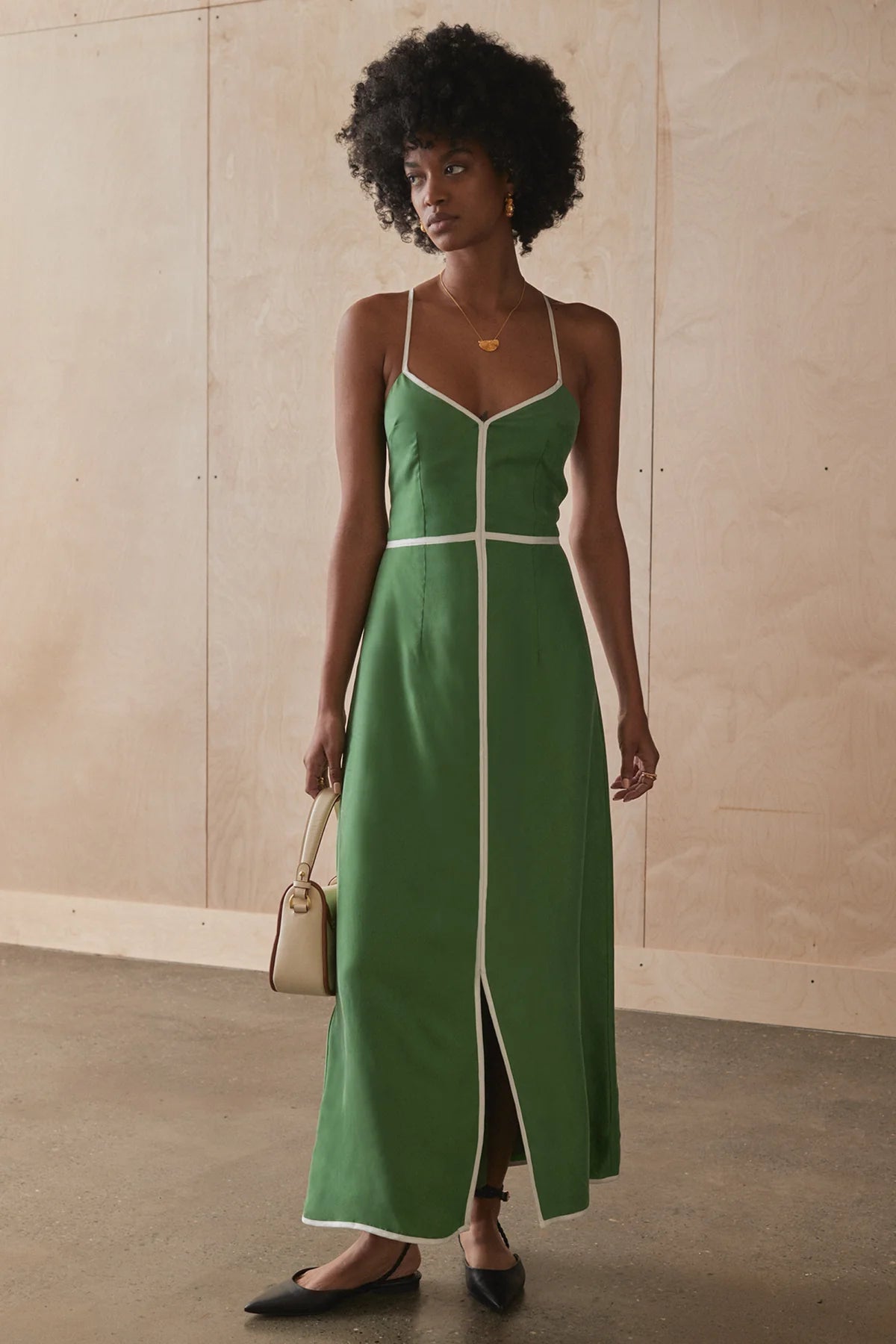 Sancia Isobel Dress - Matcha at cloth in brick front view