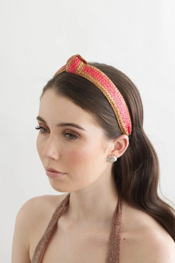 Bowies World Capri Headband Tan/Watermelon at cloth in Brick side view 