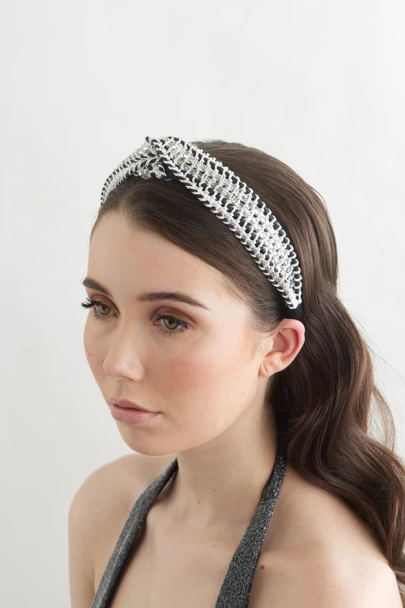 Bowies World Como Headband - Black at cloth in brick side view 