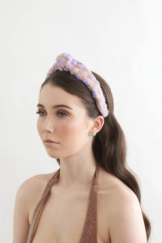 Bowies World Lisbon Headband - Lilac at cloth in brick side view 
