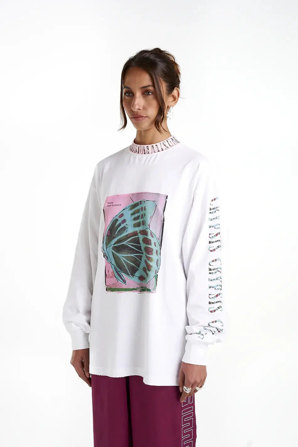 LS Band Tee - Crypsis Summi Summi side view at cloth in brick