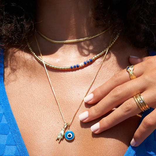 Occhio Gold Charm Necklace Arms of Eve