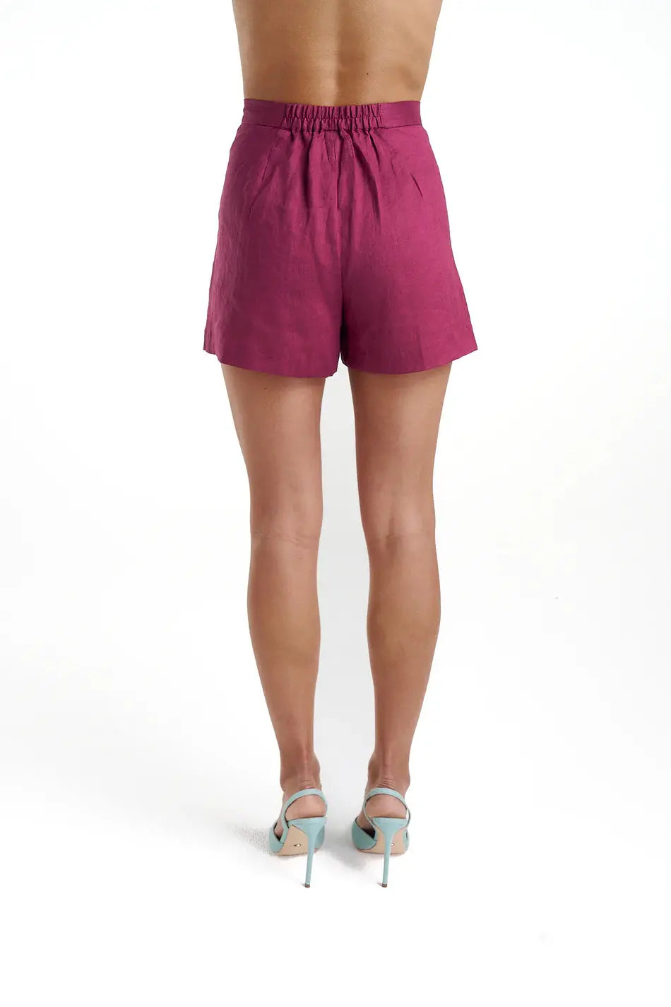 Skort - Plum Summi Summi back view close up at cloth in brick